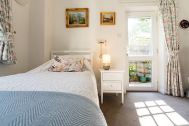 Bedroom at Coombehouse care home Reading